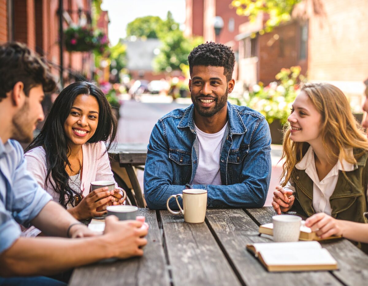 Firefly_students having coffee in Georgetown at an outdoor cafe 959017